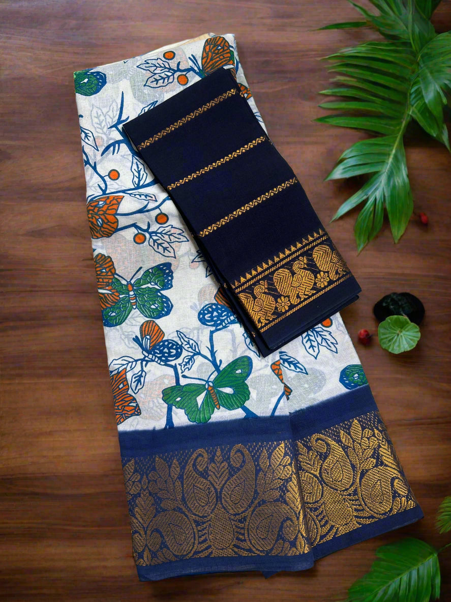 Saree with floral and butterfly pattern on a wooden tray