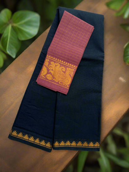 Black saree with gold border and red blouse on a white fabric background