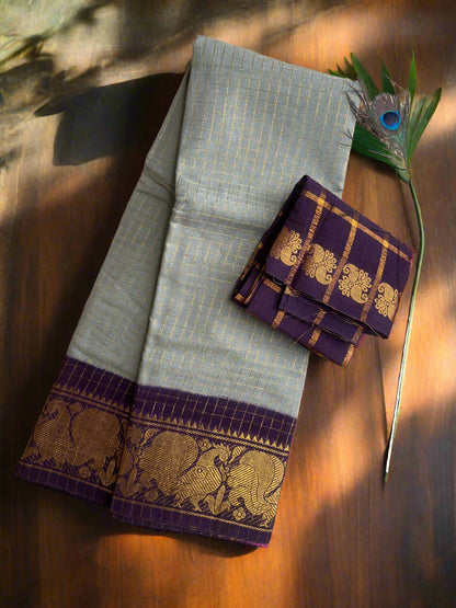 Traditional saree with elephant design on a textured surface
