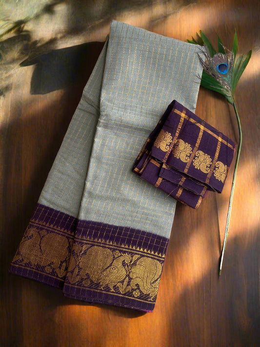 Traditional saree with elephant design on a textured surface