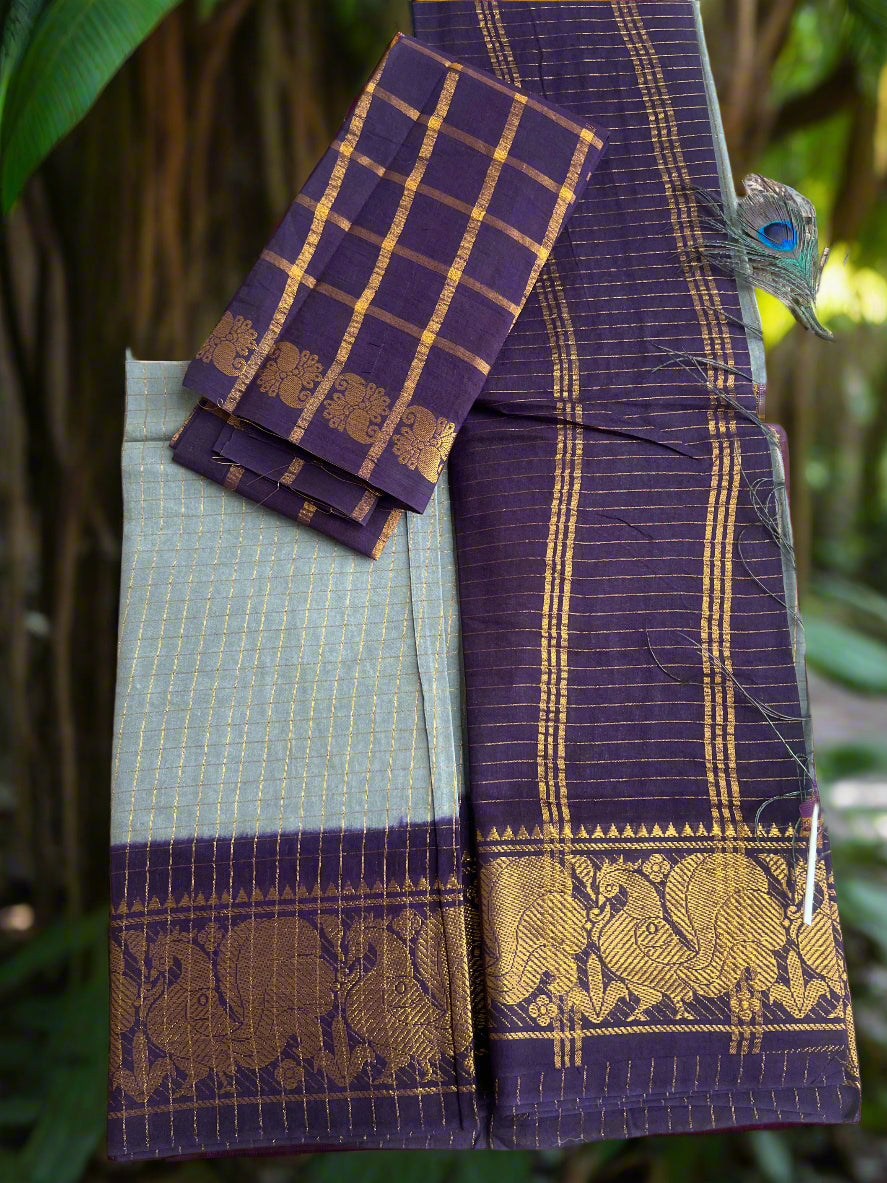 Traditional saree with elephant patterns on a textured surface