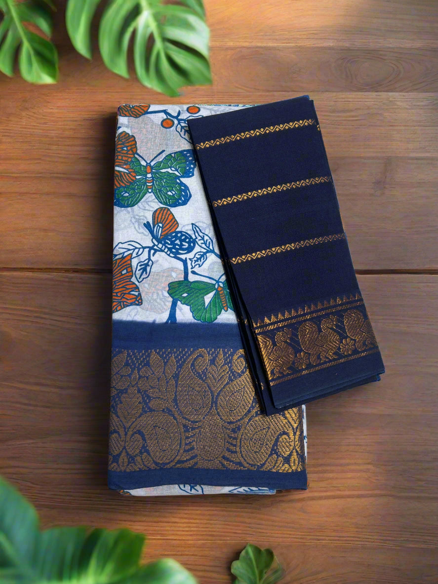 Two traditional sarees with intricate patterns on a wooden surface.