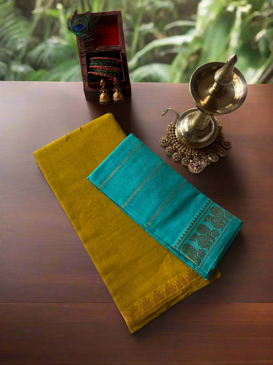 Two colorful cloths on a white fabric background with decorative items.