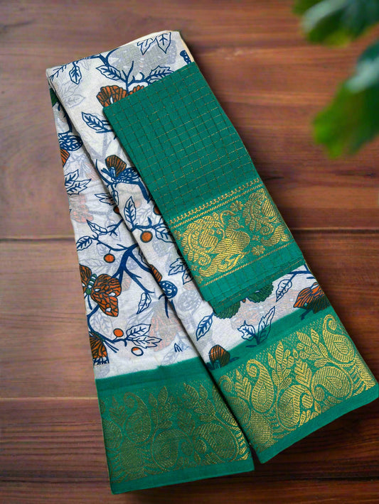 Two traditional sarees with intricate patterns on a wooden surface.