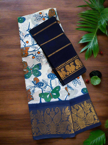 Saree with floral and butterfly pattern on a wooden tray
