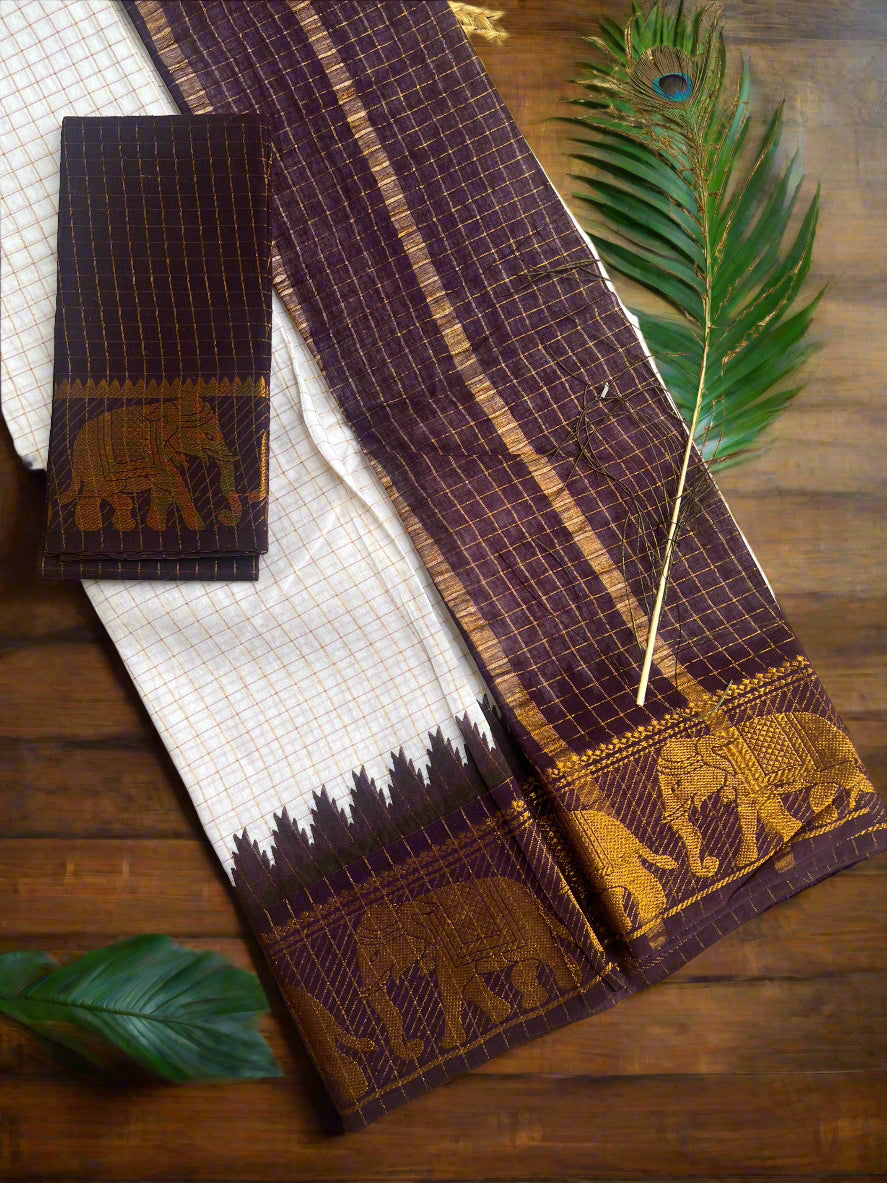 Purple scarf with elephant patterns on a woven surface